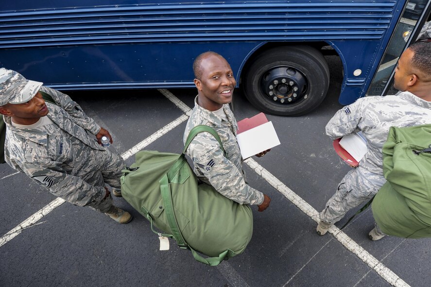 Senior Airman Bright Gyebi, 413th Aeromedical Staging Squadron health services specialist, shares a smile with the camera as he boards a bus Aug. 4 during Exercise Avian 2017 at Dobbins Air Reserve Base, Ga. Nearly 50 of the squadron’s Airmen traveled to Dobbins to take part in the three-day exercise to train on staging and holding patients in preparation for flight. (U.S. Air Force photo by Jamal D. Sutter)