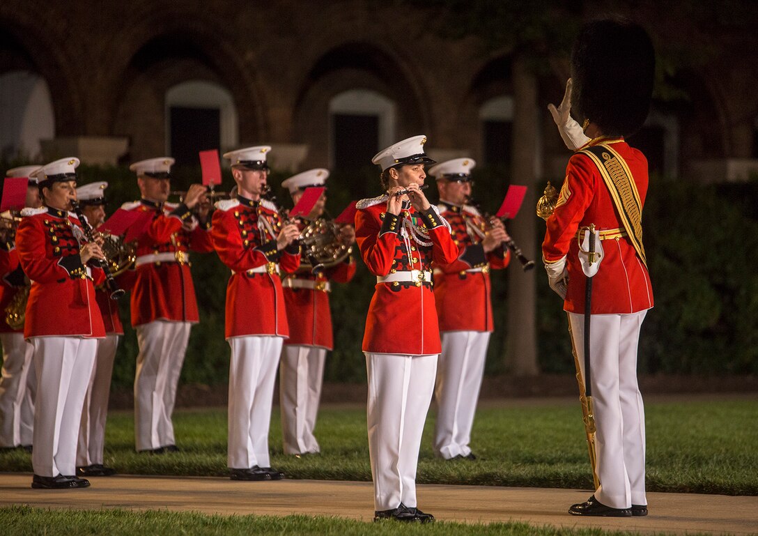Staff Sgt. Courtney Morton, “The President’s Own” U.S. Marine Band, plays a solo during the Staff Noncommissioned Officer Evening Parade at Marine Barracks Washington D.C., Aug. 4, 2017. The guest of honor for the parade was retired Marine Corps Col. Archie Simpson, Guadalcanal veteran, and the hosting official was Lt. Gen. James B. Laster, director, Marine Corps Staff. (Official Marine Corps photo by Cpl. Robert Knapp/Released)