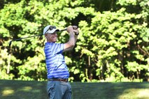 Larry Shaw, 434th Air Refueling Wing commander, drives a ball into the fairway at a local golf course in Peru, Ind., July 29, 2017. The golf scramble raised money for the upcoming Air Force Ball. (U.S. Air Force photo/ Senior Airman Cali Wetli)