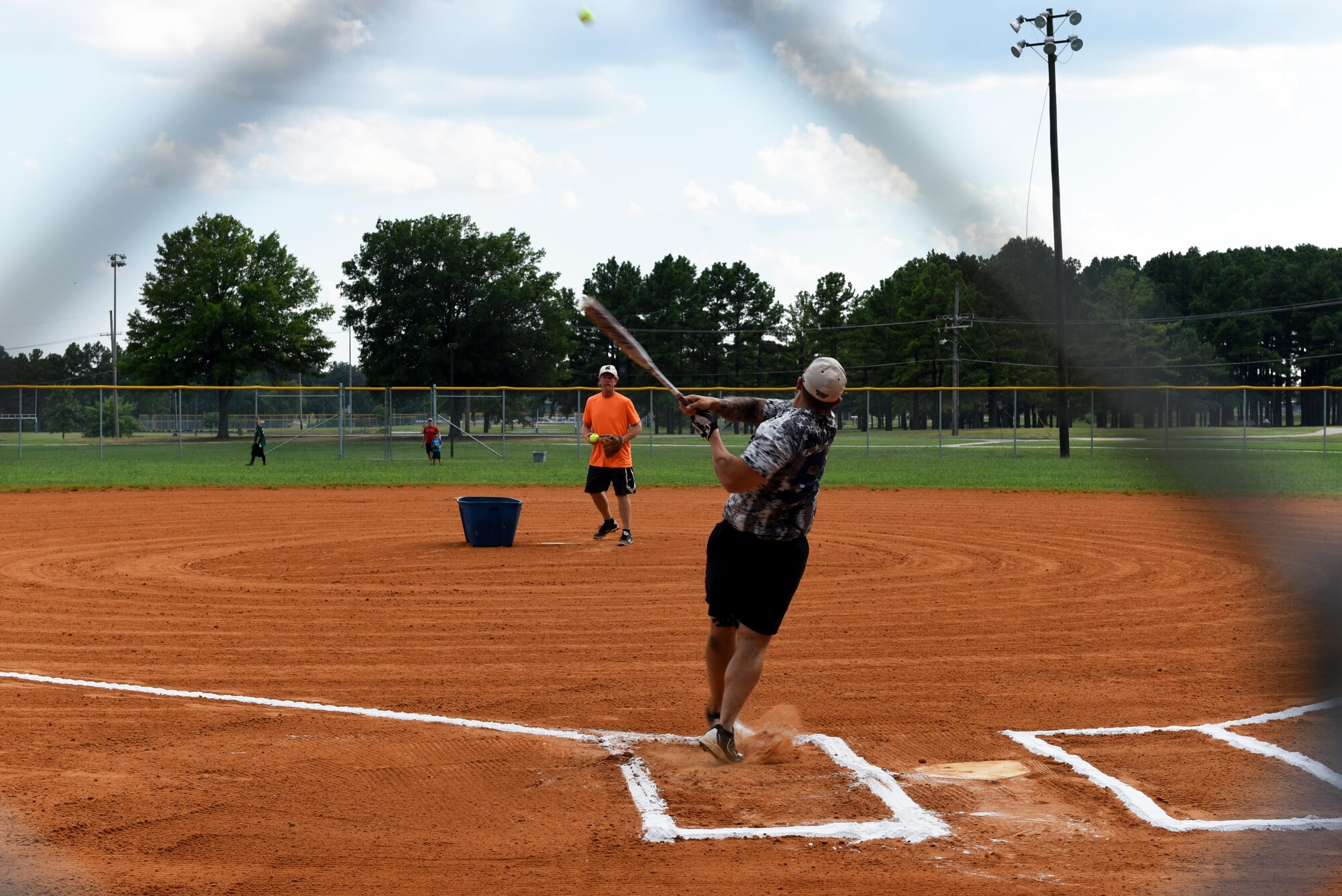 Staff Sgt. Robert Mullen, 19th Maintenance Group airspace ground equipment specialist, hits a home run during the 2017 Softball All-Star Day Home Run Derby Aug. 3, 2017, at Little Rock Air Force Base, Ark. The Home Run Derby was a free-for-all batting match for players to claim the derby trophy. (U.S. Air Force photo by Senior Airman Mercedes Taylor)