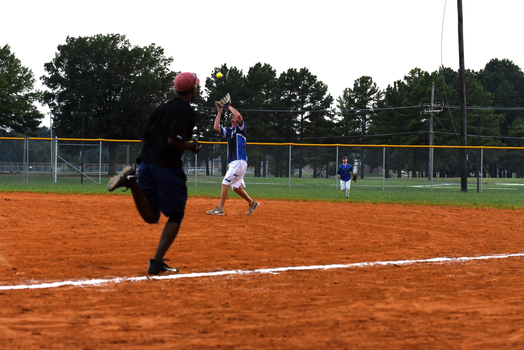 Tech Sgt. Bolin Belles, National League team member, runs for first base during the 2017 Softball All-Star Day game Aug. 3, 2017, at Little Rock Air Force Base, Ark. After winning 14-9, the National League took home the trophy. (U.S. Air Force photo by Senior Airman Mercedes Taylor)