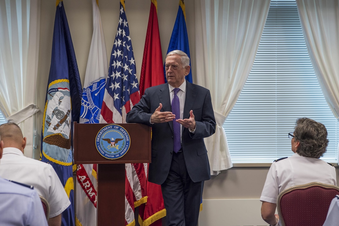 Defense Secretary speaks with students at the Pentagon.