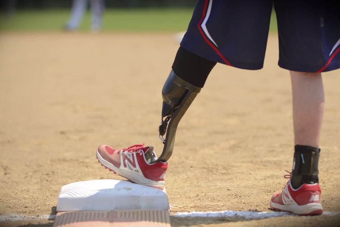 A wounded warrior uses a prosthetic leg.