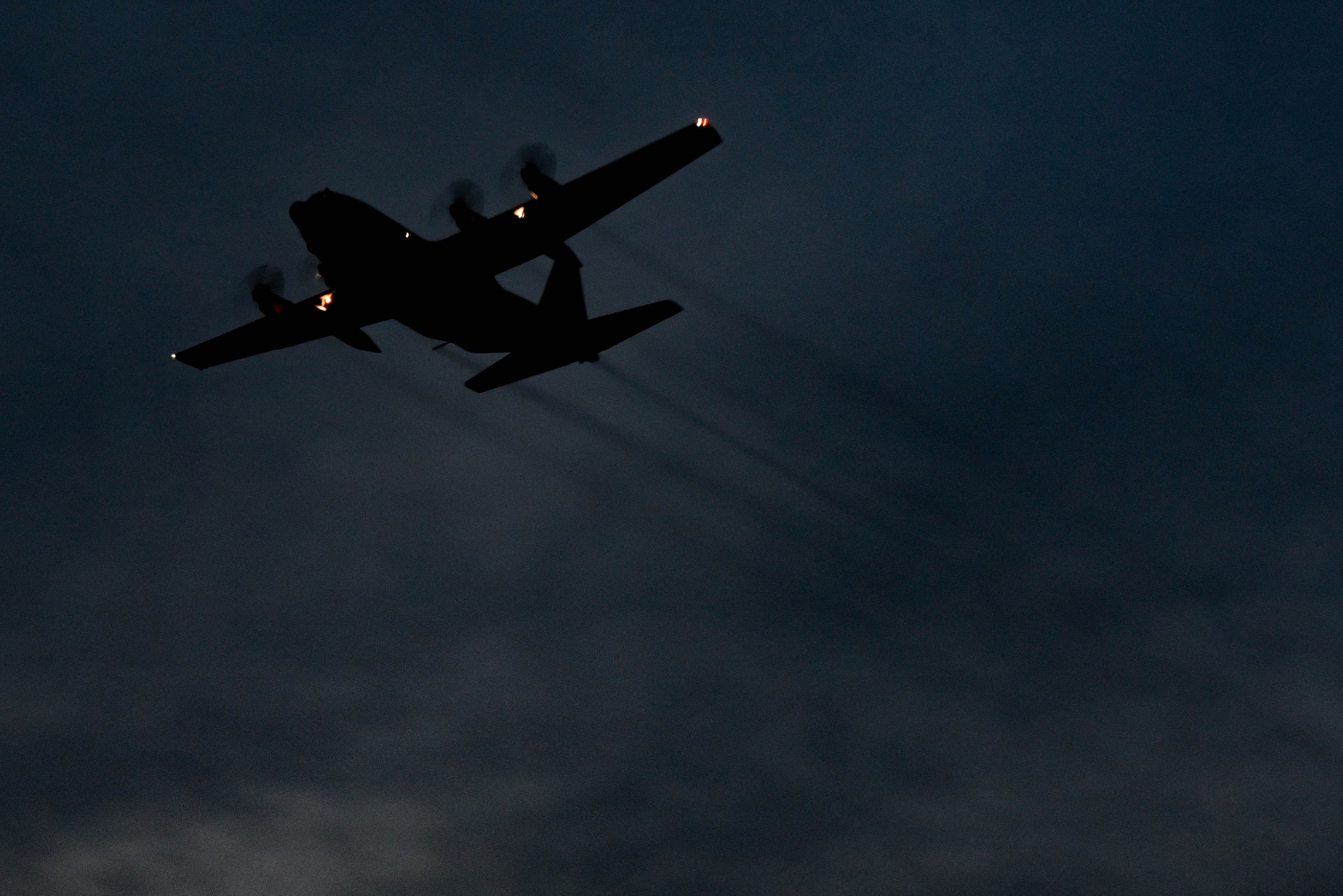 A U.S. Air Force C-130 Hercules assigned to the 757th Airlift Squadron sprays for mosquitos over Joint Base Langley-Eustis, Virginia., August 1, 2017.