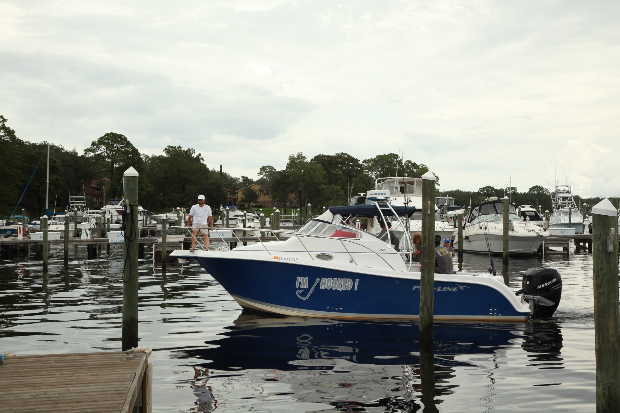 A boat carrying Juan “Bubba” Bush III, along with family and friends, returns