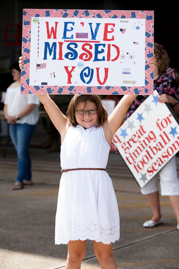 Ava waits to greet her father, Capt. Quentin Biles, a pilot assigned to Marine Aerial Refueler Transport Squadron 252, at Marine Corps Air Station Cherry Point, N.C., Aug. 3, 2017. VMGR-252 returned home from a six month deployment in support of the Special Purpose Marine Air Ground Task Force in Africa. VMGR-252 is assigned to Marine Aircraft Group 14, 2nd Marine Aircraft Wing. (U.S. Marine Corps Photo by Lance Cpl. Courtney T. Miner)