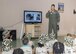 Col. Corey Simmons, 436th Airlift Wing vice commander, briefs a chalk of children during Kids Understanding Deployment Operations Aug. 3, 2017, at the Youth Center on Dover Air Force Base, Del. The briefing was done at the beginning of each chalk and was not only given by the vice wing commander but also by intel, public health and a few other organizations. (U.S. Air Force photo by Staff Sgt. Jared Duhon)