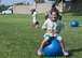 Leah Porreca, a child with the Youth Center, races to the finish line on a ball during Kids Understanding Deployment Operations Aug. 3, 2017, at the Youth Center on Dover Air Force Base, Del. The event sends kids through a simulated deployment processing line, obstacle course and other educational stations to give them a perspective on how military members prepare and process to deploy. (U.S. Air Force photo by Staff Sgt. Jared Duhon)