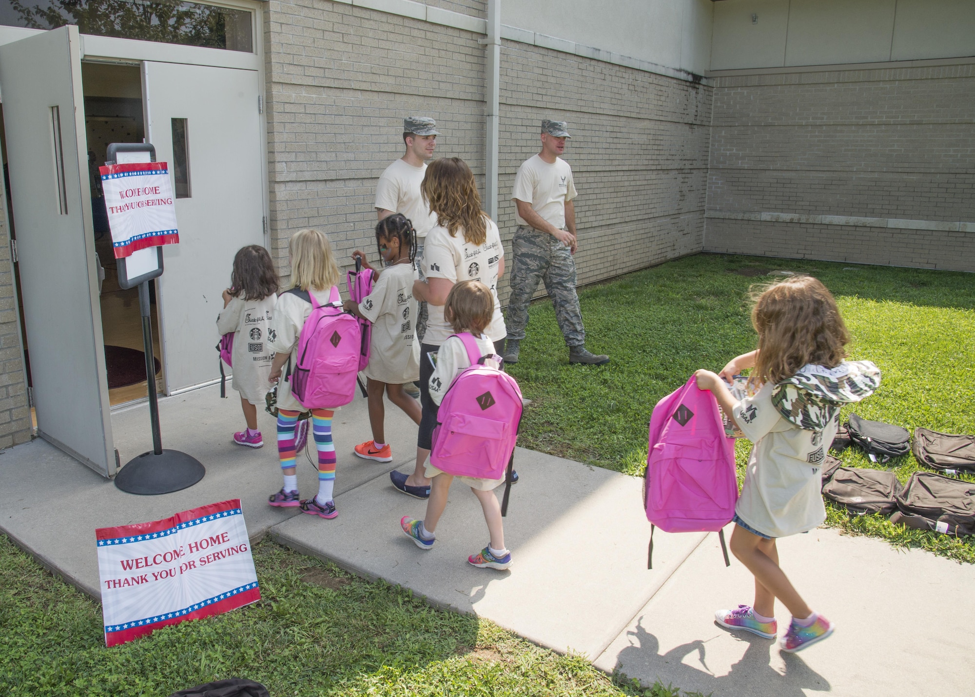 A chalk of children were welcomed “home” after learning about deployments during the Kids Understanding Deployment Operations Aug. 3, 2017, at the Youth Center on Dover Air Force Base, Del. More than 250 children took part in the event, increasing the number of military children educated on deployments. (U.S. Air Force photo by Staff Sgt. Jared Duhon)