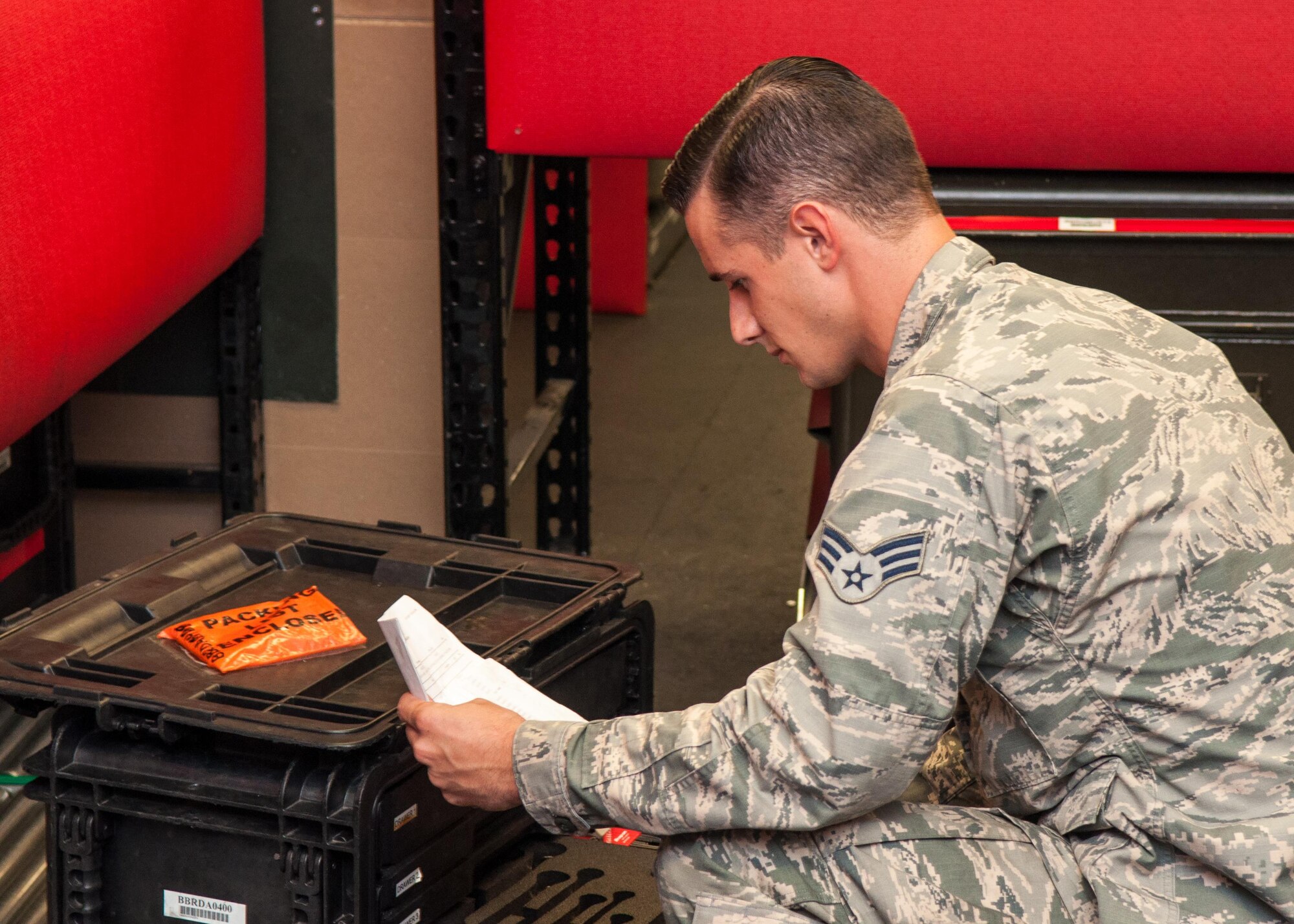 Senior Airman Timothy Brown, a B-52 Stratofortress crew-chief assigned to the 707th Maintenance Squadron, inventories a tool box on Barksdale Air Force Base, La. Aug. 5, 2017.