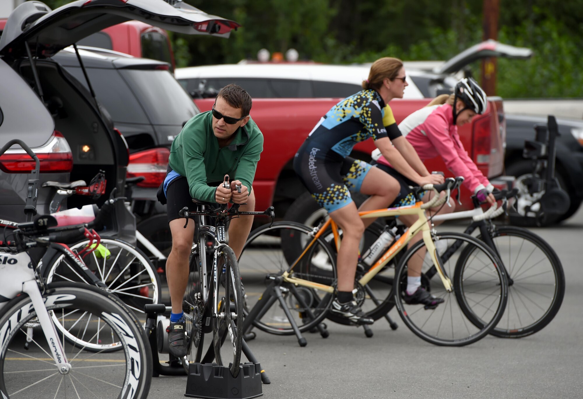 Arctic Bicycle Club athletes perform pre-race exercises in preparation for the 10-mile time-trial race at the Moose Run Golf Course at Joint Base Elmendorf-Richardson, Alaska, Aug. 3, 2017. For more than 15 years, the club has hosted road race events at JBER.