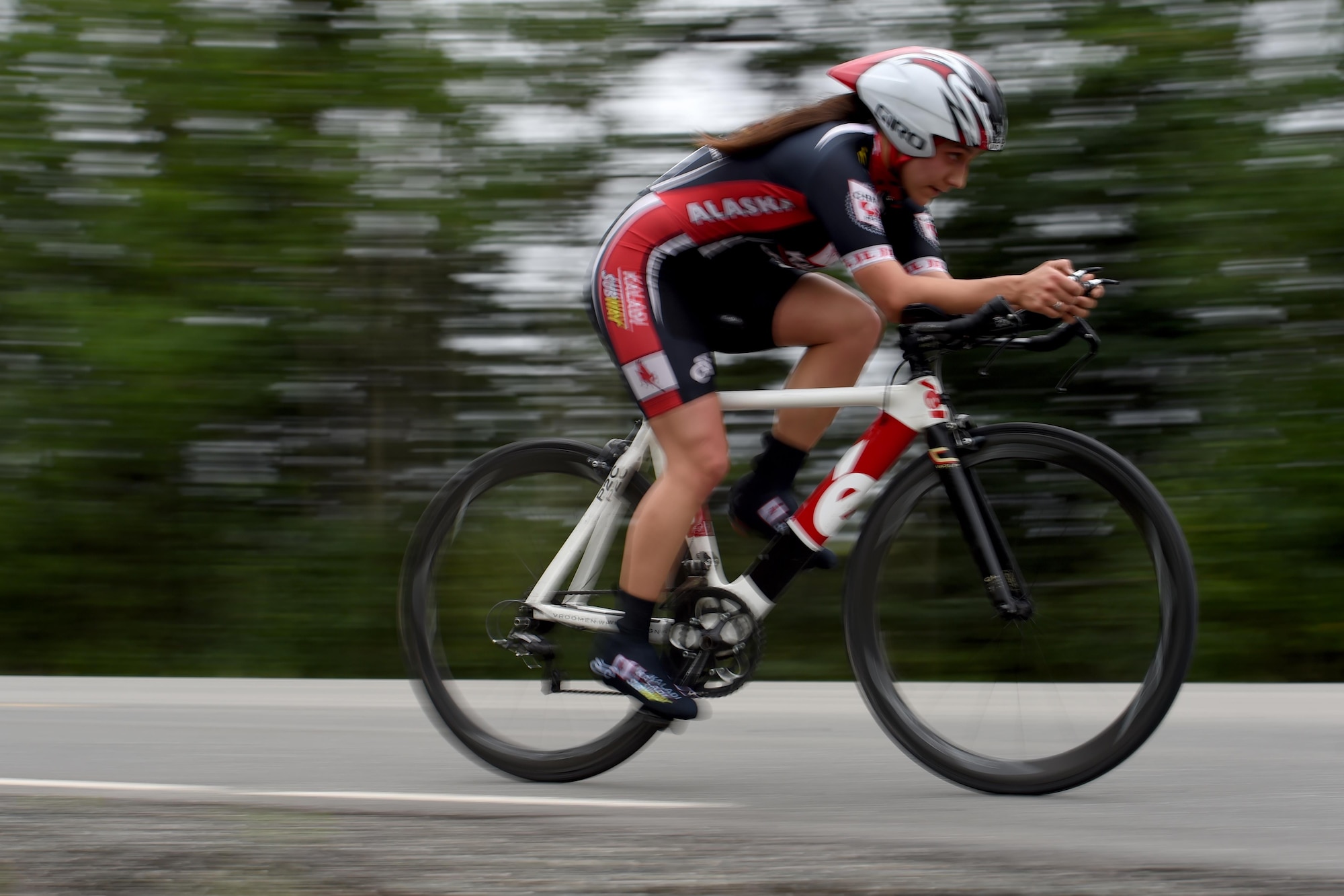 Kinsey Loan streaks down the race path during the Moose Run time-trial race at Joint Base Elmendorf-Richardson, Alaska, Aug. 3, 2017. For more than 15 years, the club has hosted road race events at JBER.