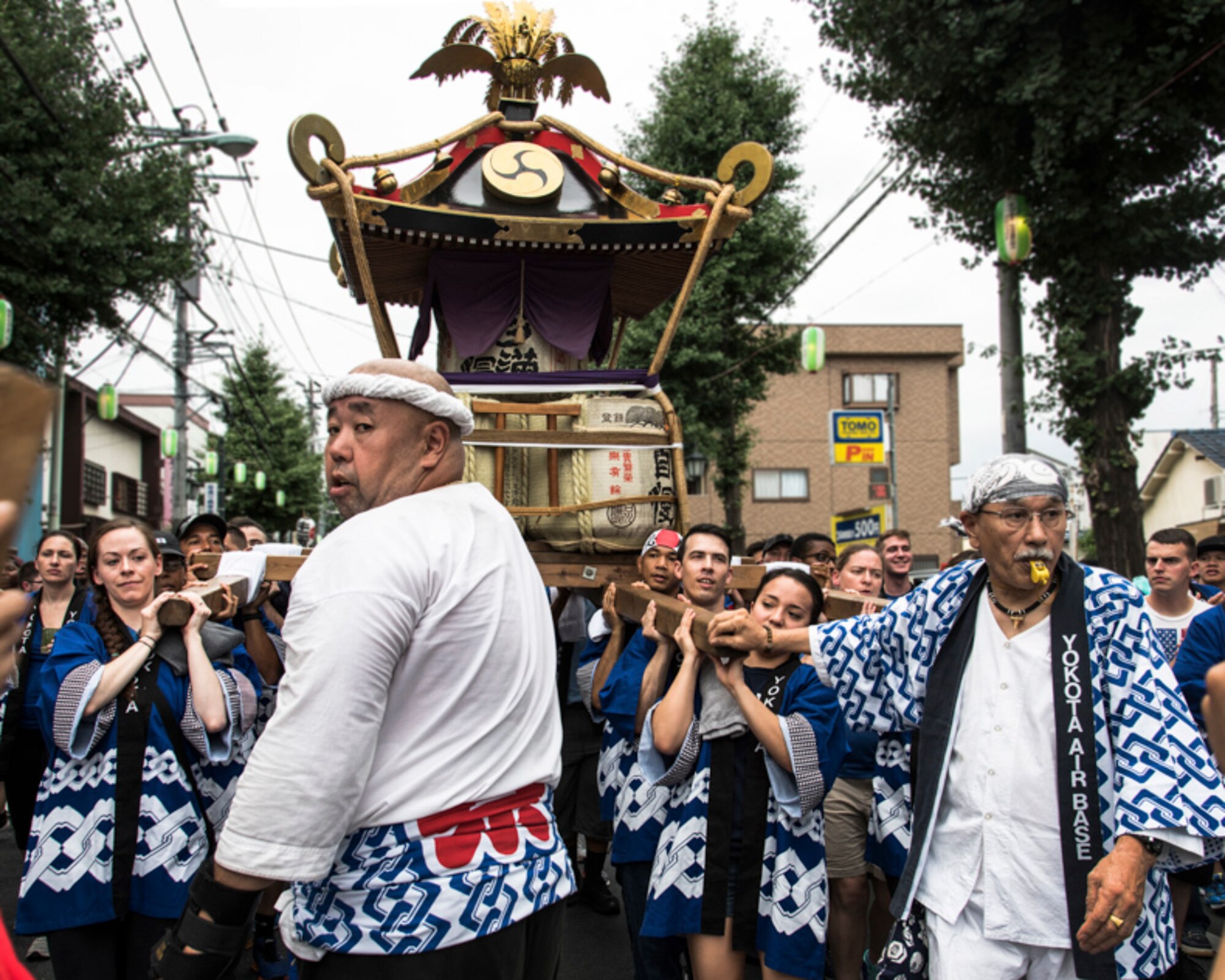 Members from Yokota Air Base carry a mikoshi
