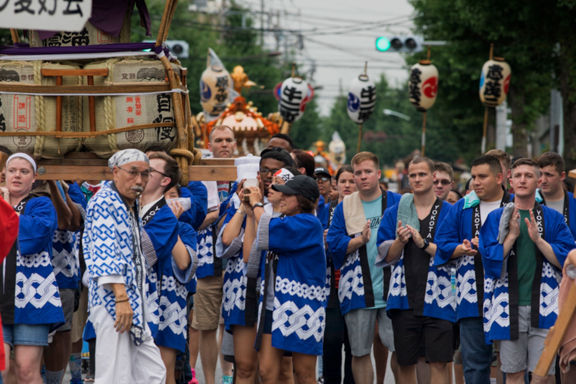 Members from Yokota Air Base carry the wing mikoshi