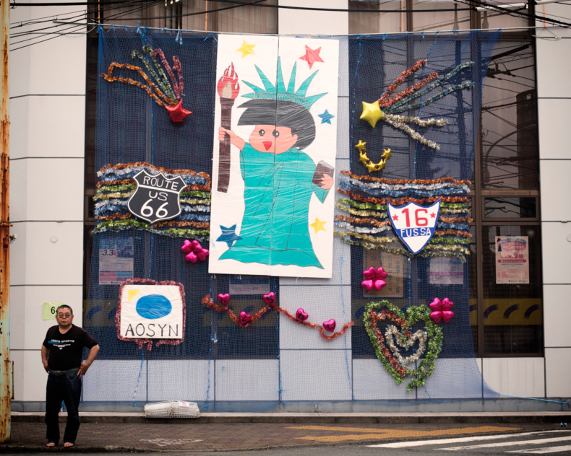 A man stands on a street during the 67th Annual Tanabata Festival at Fussa City