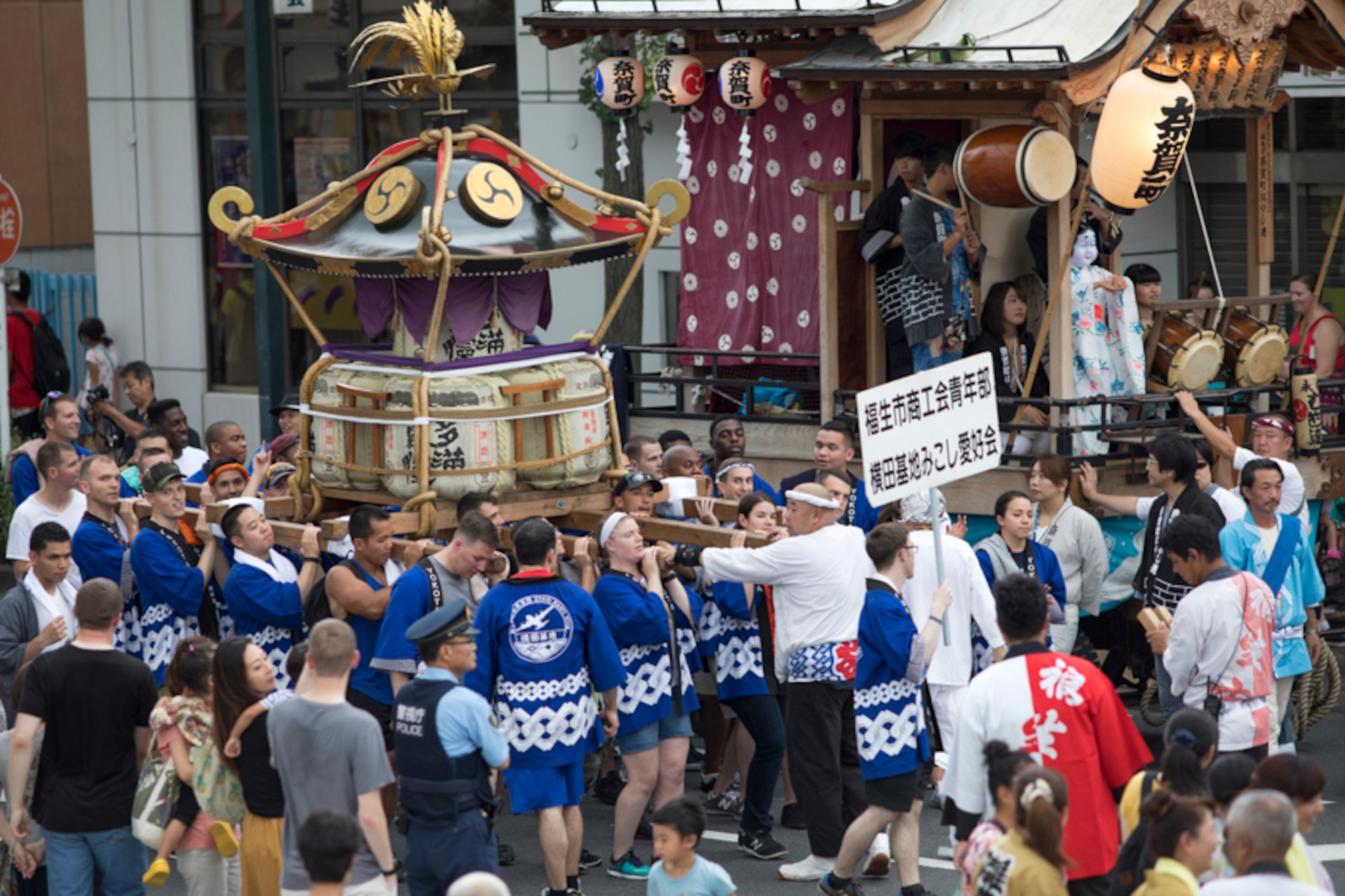 Members from Yokota Air Base carry the wing mikoshi