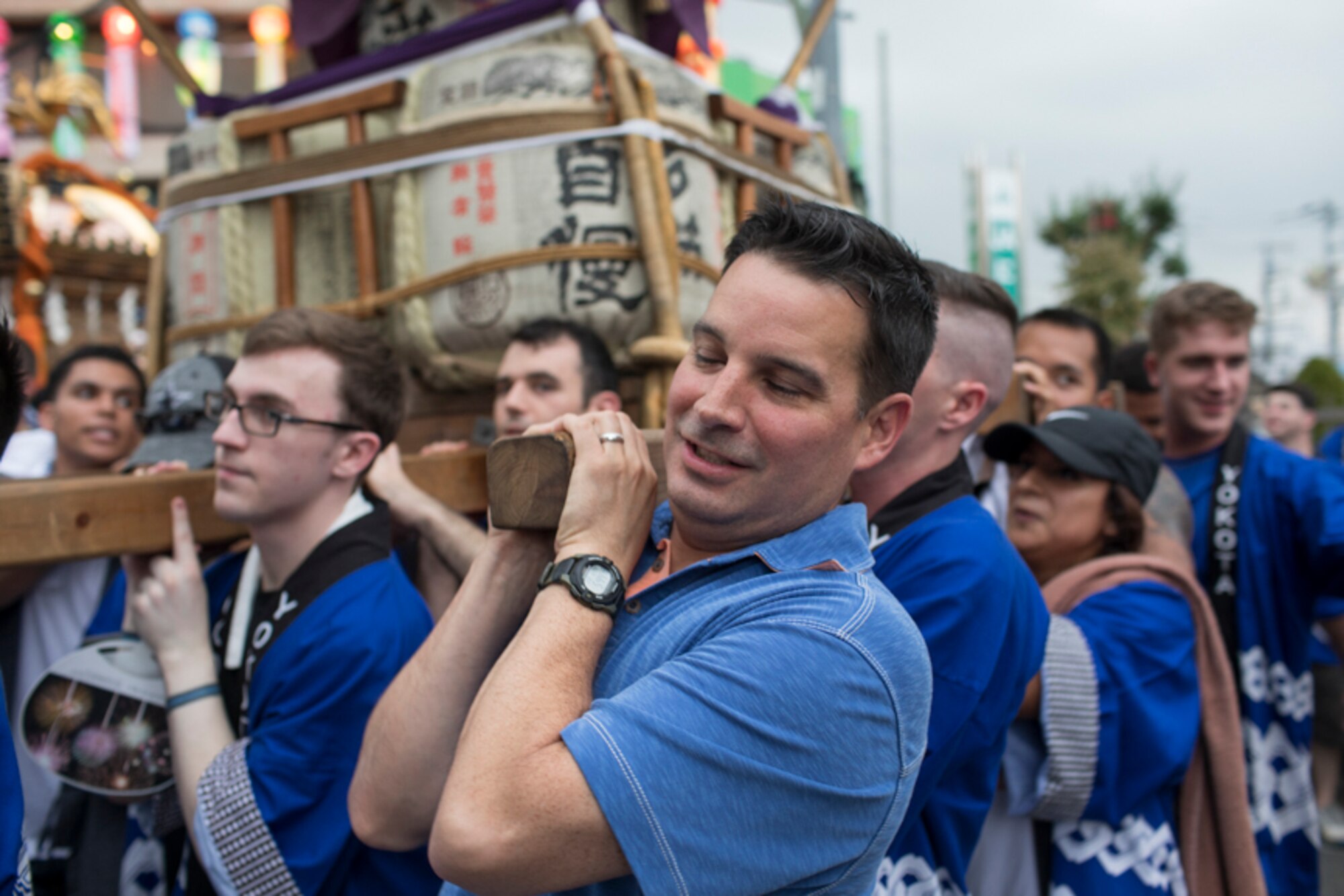 Col. Sergio Vega Jr., 374th Airlift Wing vice commander, carries the wing mikoshi