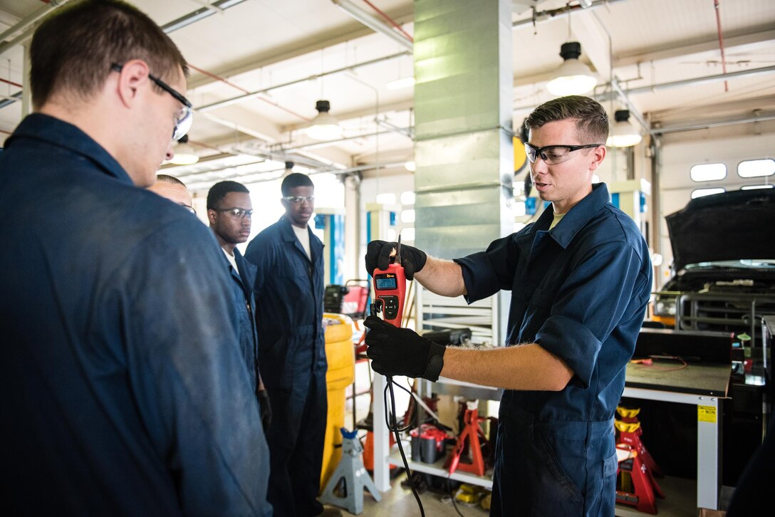 Staff Sgt Scott Hitchner, 512th Logistics Readiness Squadron, trains fellow 512 LRS Airmen on a power production module, July 28, 2017 at Aviano Air Force Base, Italy.