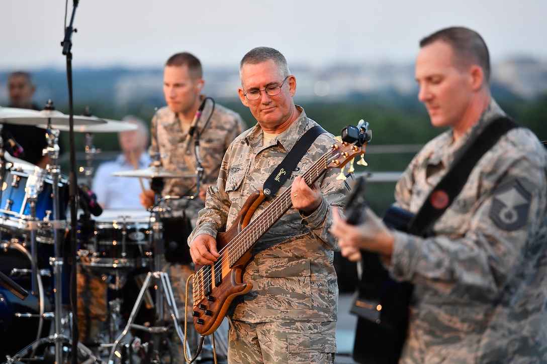 Members of the Air Force Band perform during the final 2017 Heritage to Horizons summer concert series in Arlington, Va., Aug. 4, 2017.