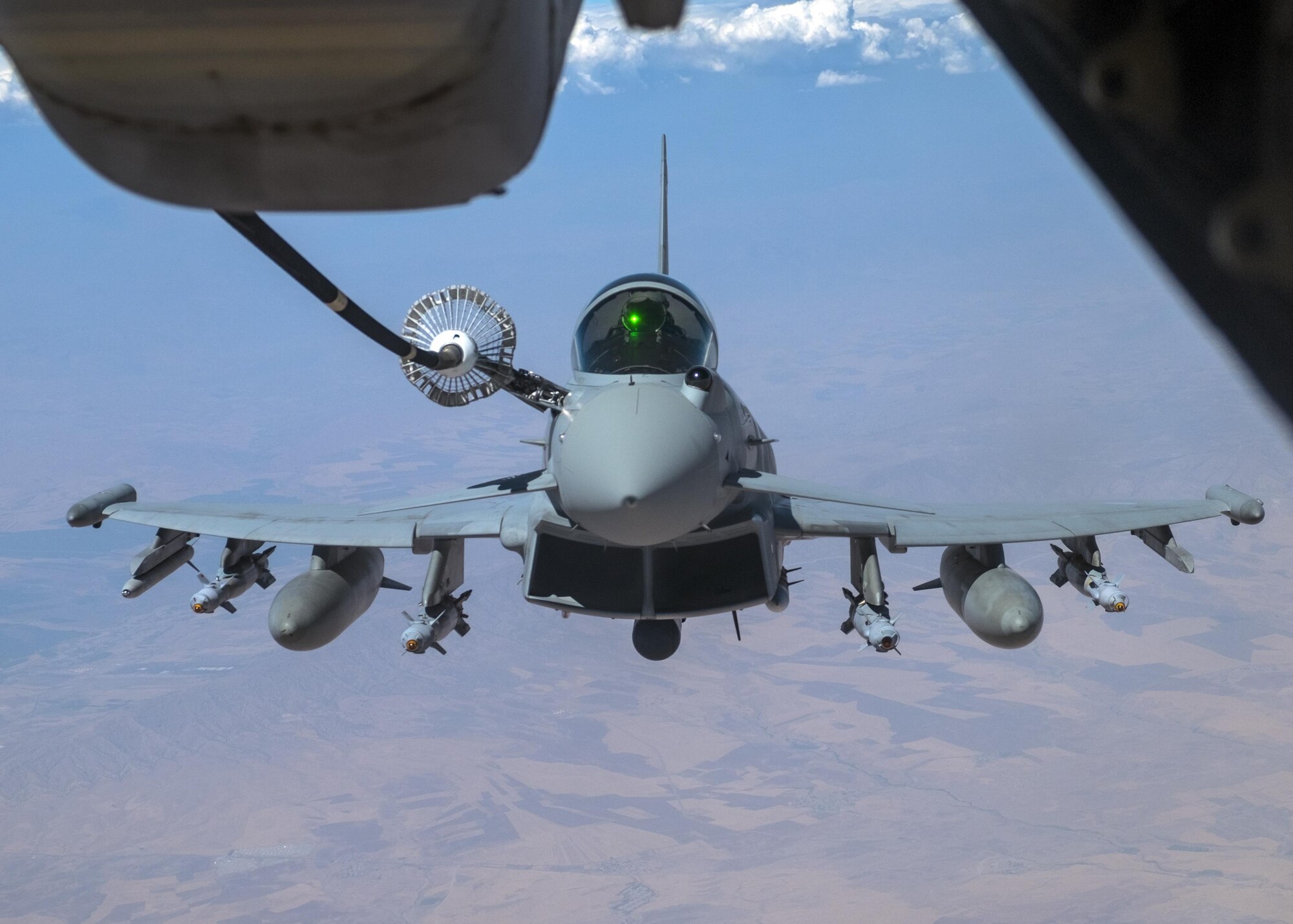 A British Royal Air Force FGR4 Eurofighter Typhoon receives fuel from a U.S.KC-10 above Southwest Asia, August 2, 2017.