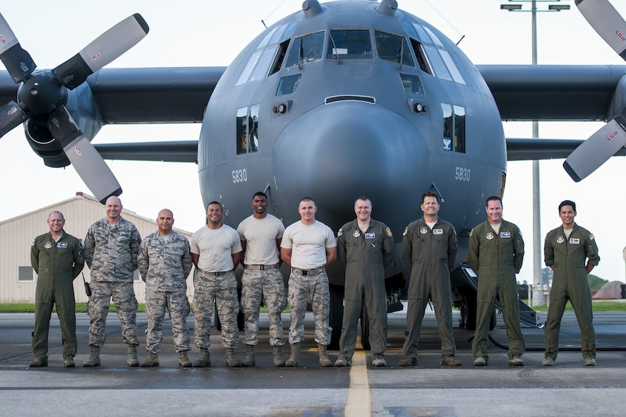 The 920th Rescue Wing commander, Col. Kurt Matthews, left, poses with fellow aircrew and maintainers in front of the HC-130N King 30 Aug. 7, 2017, at Patrick Air Force Base, Florida, before heading to Davis-Monthan Air Force Base, Arizona. (U.S. Air Force photo/Staff Sgt. Jared Trimarchi)
