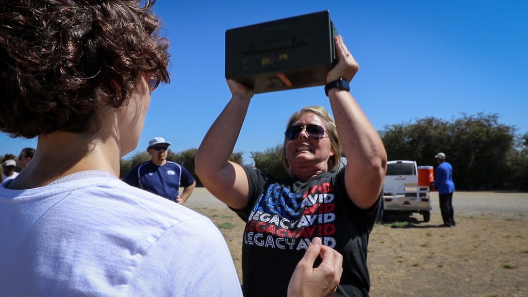 Dionne Harris, an educator from Fort Worth, Texas participates in a combat fitness test during the Educator's Workshop on Marine Corps Recruit Depot San Diego, Calif., Aug. 8, 2017. The workshop is a four-day program designed to better inform high school and college educators about the benefits and opportunities available during service in the Marine Corps. This allows the attendees to return to their place of business and provide firsthand experience and knowledge to individuals interested in military service. (Marine Corps photo by Sgt. Danielle Rodrigues/Released)