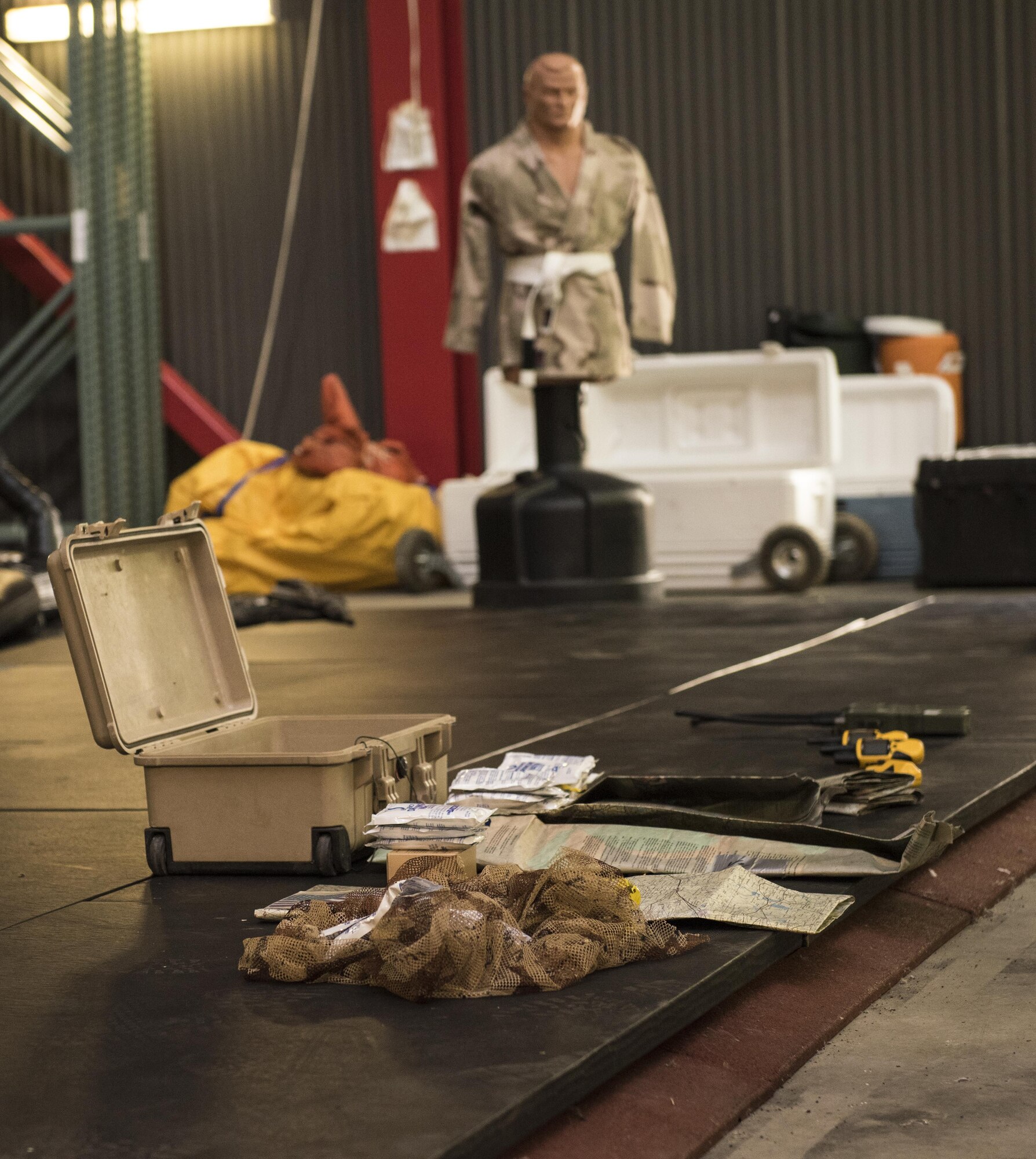 Communication devices and other supplies are prepared to be used for a U.S. Air Force Survival, Evasion, Resistance and Escape training session for aircrew members that will last well into the evening in a remote area near Travis Air Force Base, Calif., Jul. 17, 2017.