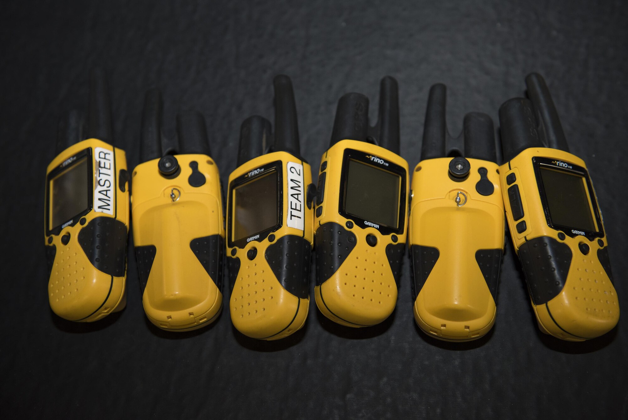 Communication devices and other supplies are prepared to be used for a U.S. Air Force Survival, Evasion, Resistance and Escape training session for aircrew members that will last well into the evening in a remote area near Travis Air Force Base, Calif., Jul. 17, 2017.
