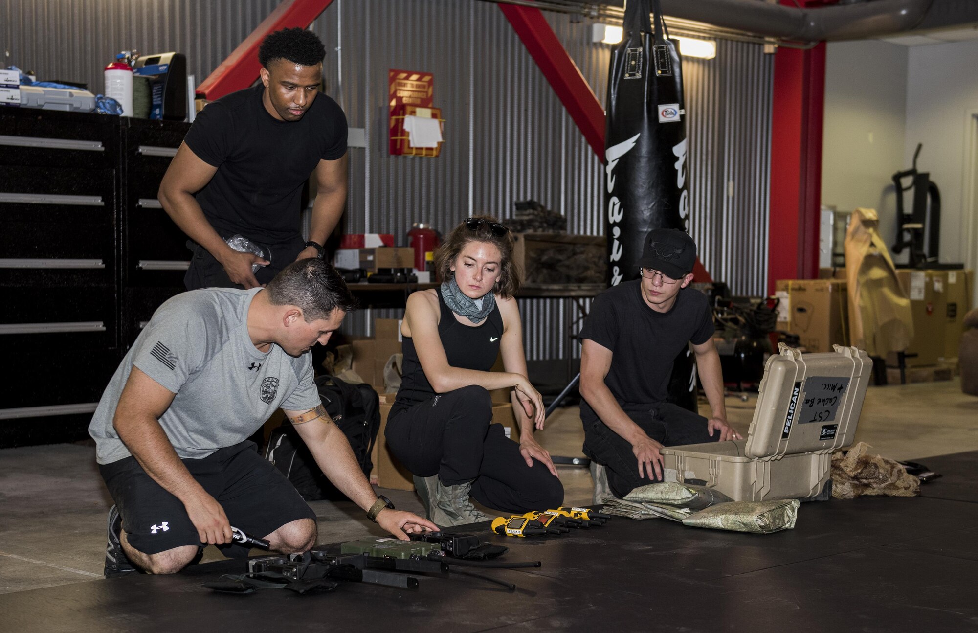 U.S. Air Force Survival, Evasion, Resistance and Escape instructors and augmentees prepare for a training session for aircrew members that will last well into the evening in a remote area near Travis Air Force Base, Calif., Jul. 17, 2017.