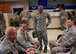 Chief Master Sgt. George Vaughn, the 932nd Airlift Wing Medical Group Superintendent, shares his best wishes and a fond farewell to several 932nd MDG Airmen during the last few minutes before they take off on a C-40 flight to the special Patriot Warrior event August 9, 2017 at Scott Air Force Base, Illinois. Both the 932nd Aeromedical Staging Squadron and Medical Squadron are preparing for a ride out of town to Patriot Warrior, which is an integrated operational and medical joint field training exercise designed to evaluate the ability to deploy medical capabilities to support joint theater operations. (U.S. Air Force photo by Lt. Col. Stan Paregien)