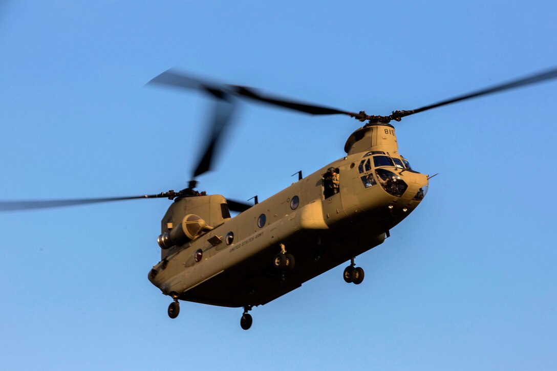 A CH-47D Chinook helicopter transports Marines.