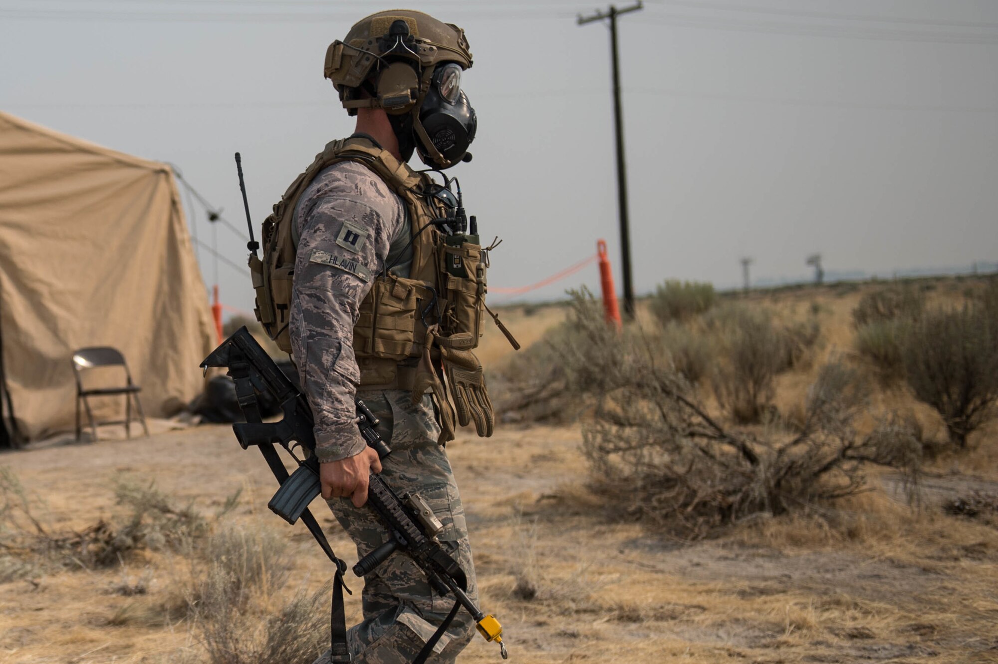 Capt. Scott Hlavin, 921st Contingency Response Squadron defense force commander, walks toward his team during exercise Mobility Guardian at Moses Lake, Wash., Aug.8, 2017.  Approximately 650 international service members will work alongside more than 3,000 U.S. service members during Mobility Guardian.  The exercise is Air Mobility Command’s premier readiness exercise, providing an opportunity for the Mobility Air Forces to train with joint and international partners in airlift, air refueling, aeromedical evacuation and mobility support.  (U.S. Air Force photo by Staff Sgt. Robert Hicks)