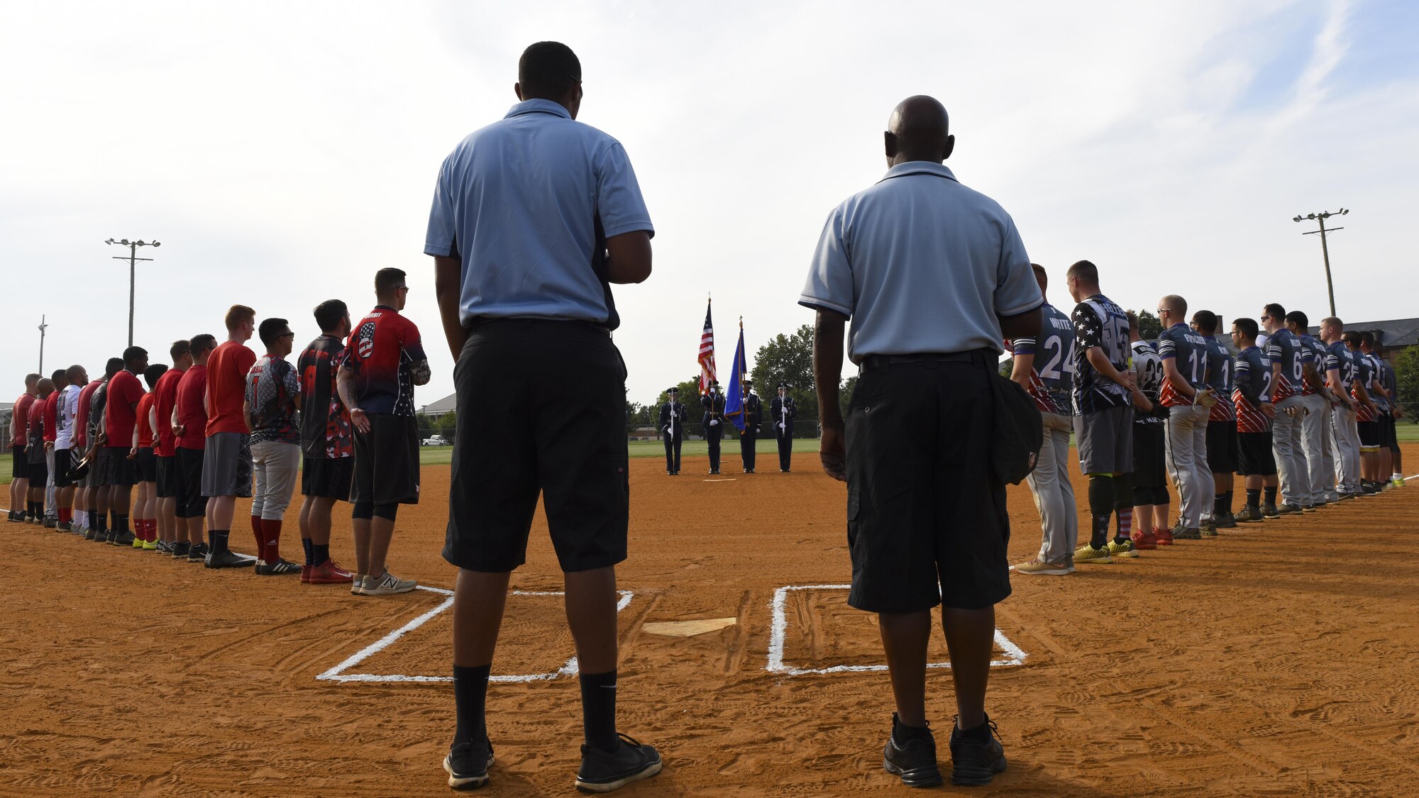 Langley Air Force Base Honor Guard members post the colors during the Intramural Softball Championship at Joint Base Langley-Eustis, Virginia., August 1, 2017.
