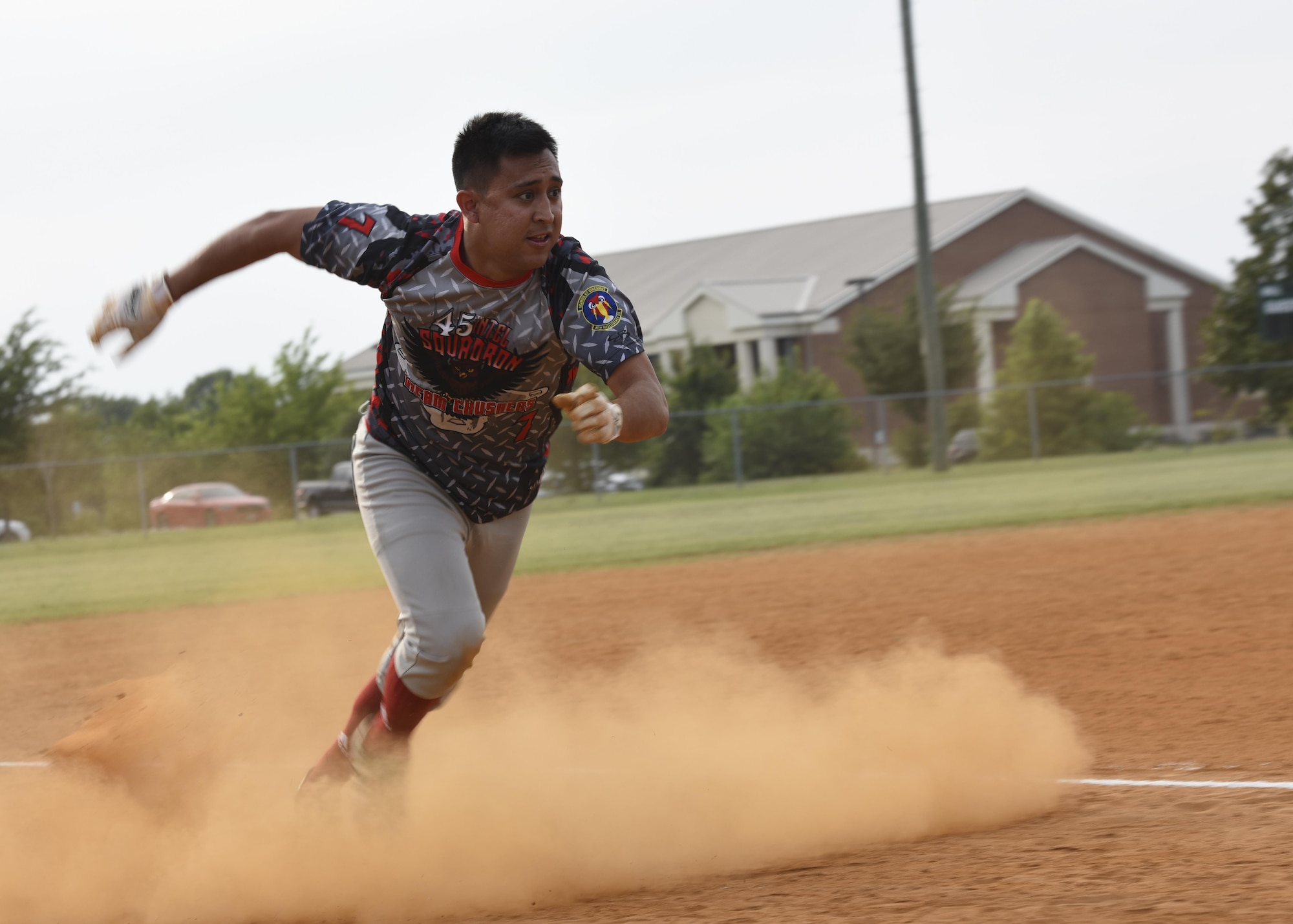 U.S. Air Force Staff Sgt. Ian, 30th Intelligence Squadron network intelligence analyst, sprints to home base during the Intramural Softball Championship at Joint Base Langley-Eustis, Virginia., August 1, 2017.