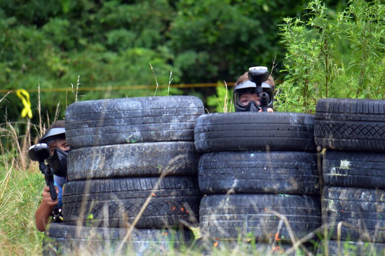 Teens couldn't help but, take a few shots at the photographer at Marine Corps Base Quantico's Paintball Park.