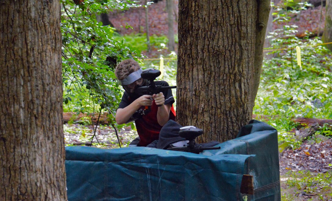 Teens playing the Valley course at the Paintball Park at Quantico