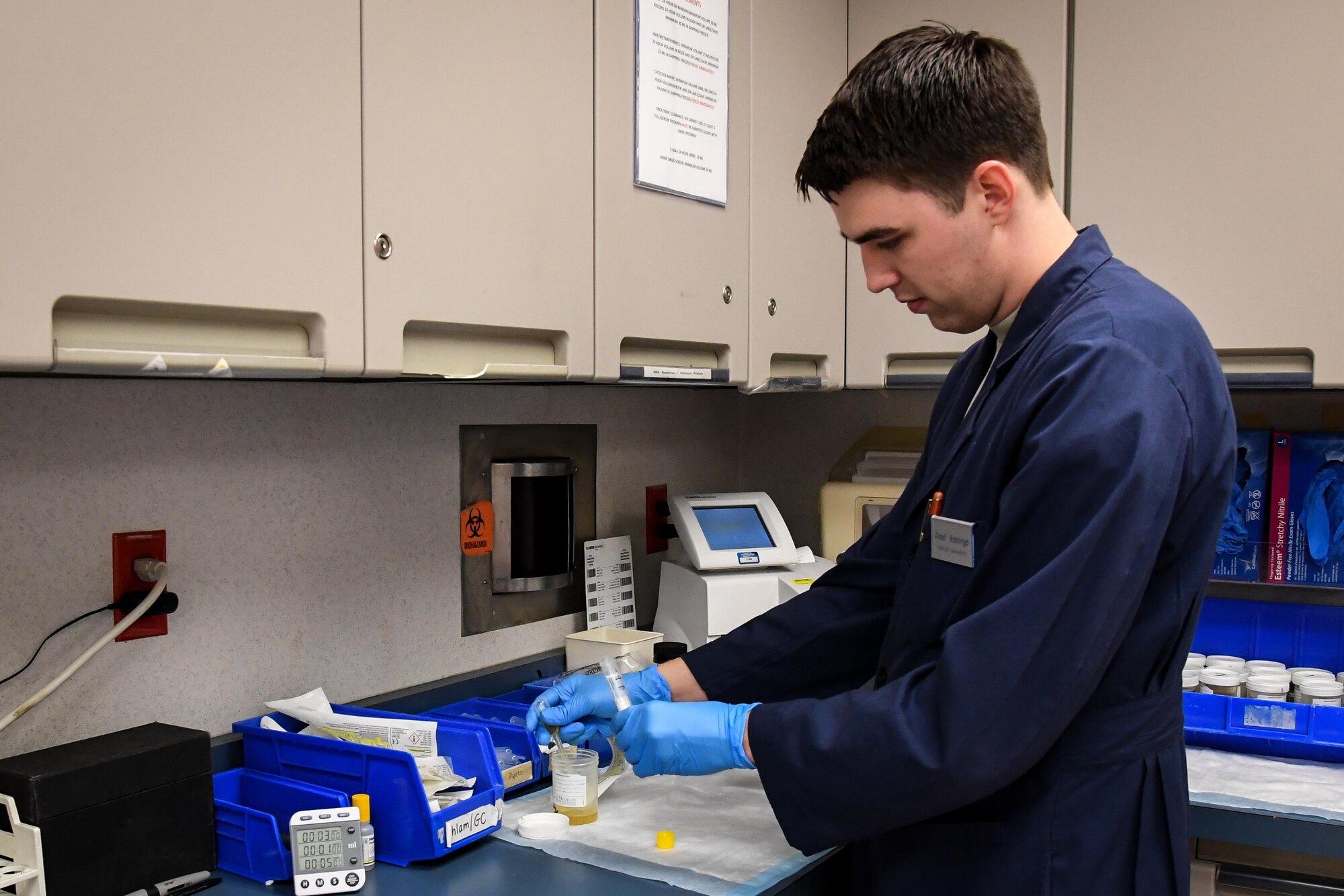 Senior Airman Josef, 2nd Medical Group laboratory technician, draws a sample for testing at Barksdale Air Force Base, La., Aug. 2, 2017.