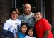 U.S. Air Force Lt. Col. Melchizedek “Kato” Martinez, 26th Cyberspace Operations Group deputy commander at Joint Base San Antonio-Lackland,  poses with his children outside of their home May 12, 2017 in San Antonio, Texas. Martinez and his family were selected as an honoree of the 2017 Portraits in Courage for their ability to overcome tragedy after they survived the 2016 Brussels Airport terrorist attack that took the life of Mrs. Martinez. (U.S. Air Force photo/Staff Sgt. Chip Pons)
