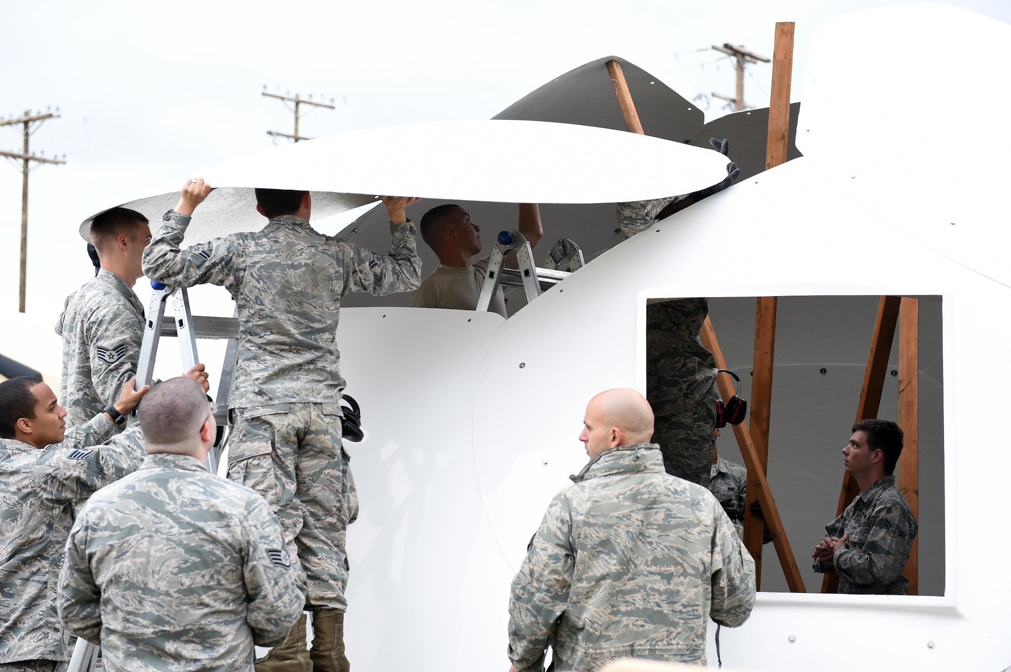 U.S. Airmen build a shelter during exercise Arctic ACE, Alaska, July 16, 2017. The exercise included Airmen from the 3rd Wing, 673d Air Base Wing, Joint Base Elmendorf-Richardson, Alaska, and 644th Combat Communications Squadron from Andersen Air Force Base, Guam, as well as Marines from the 3rd Marine Aircraft Wing, Marine Corps Air Station Miramar, Cali., and U.S. Army in Alaska Soldiers, and focused on validating new ways to deploy and maneuver assets more fluidly during a crisis or conflict.