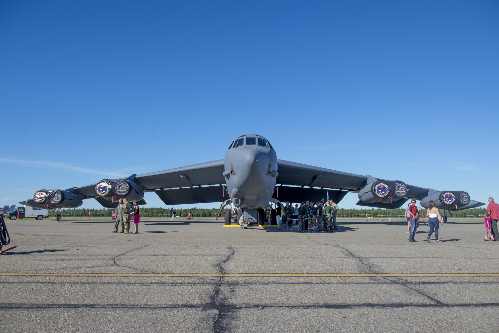Families from around the Eielson community gather around a B-52 Strafofortress bomber aircraft assigned to the 2nd Bomber Wing, Barksdale Air Force Base (AFB), La., at the Eielson AFB, Alaska, Open House, August 5, 2017. The Event featured U.S. Air Force, Navy, Army and Royal Canadian Air Force assets. (U.S. Air Force photo by Airman 1st Class Isaac Johnson)
