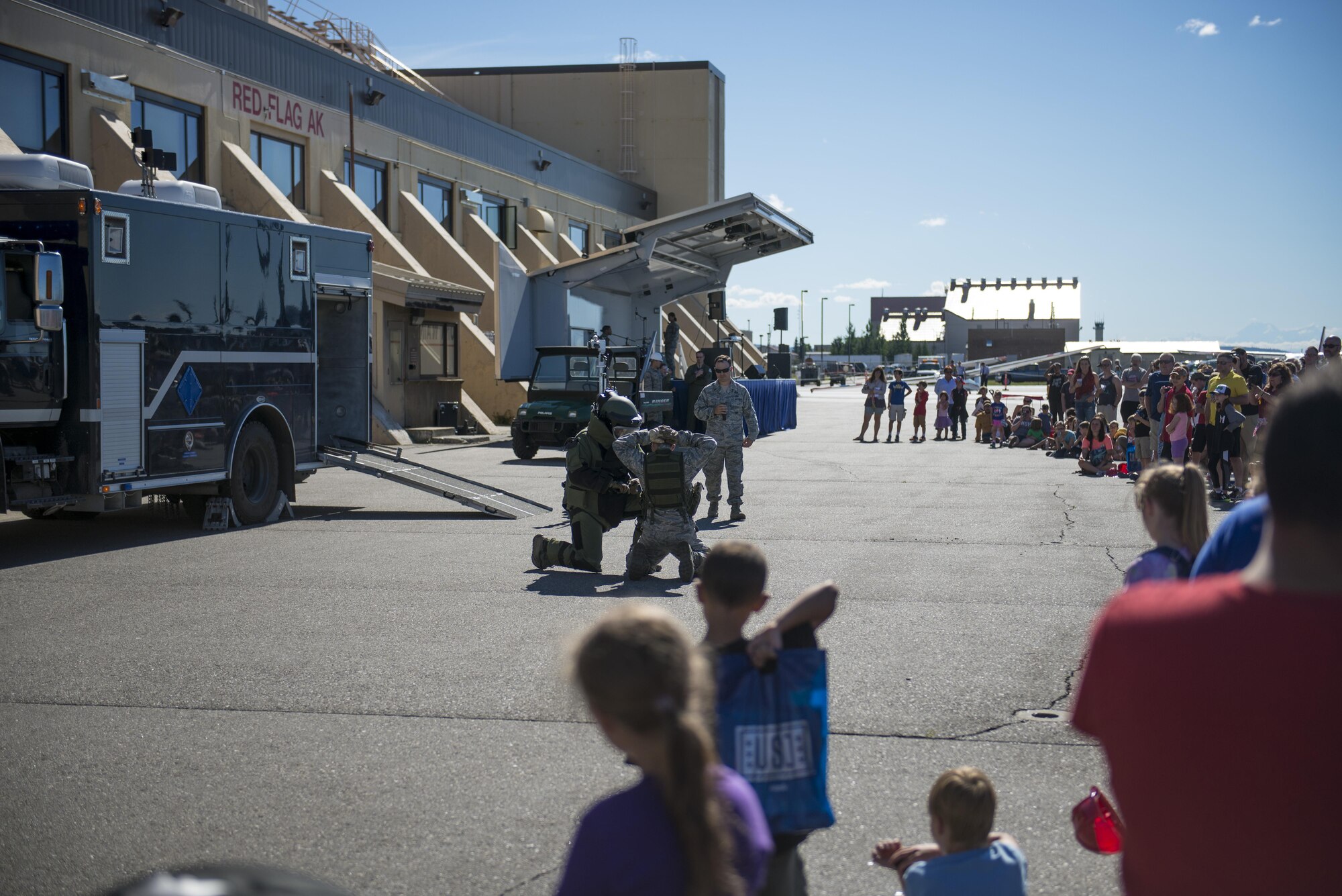 U.S. Air Force Airmen assigned to the 354th Civil Engineer Squadron perform an explosive ordnance disposal (EOD) demonstration at the Eielson Air Force Base, Alaska, Open House, August 5, 2017. EOD as well as the military working dogs held a demonstrations for the event. (U.S. Air Force photo by Airman 1st Class Isaac Johnson)