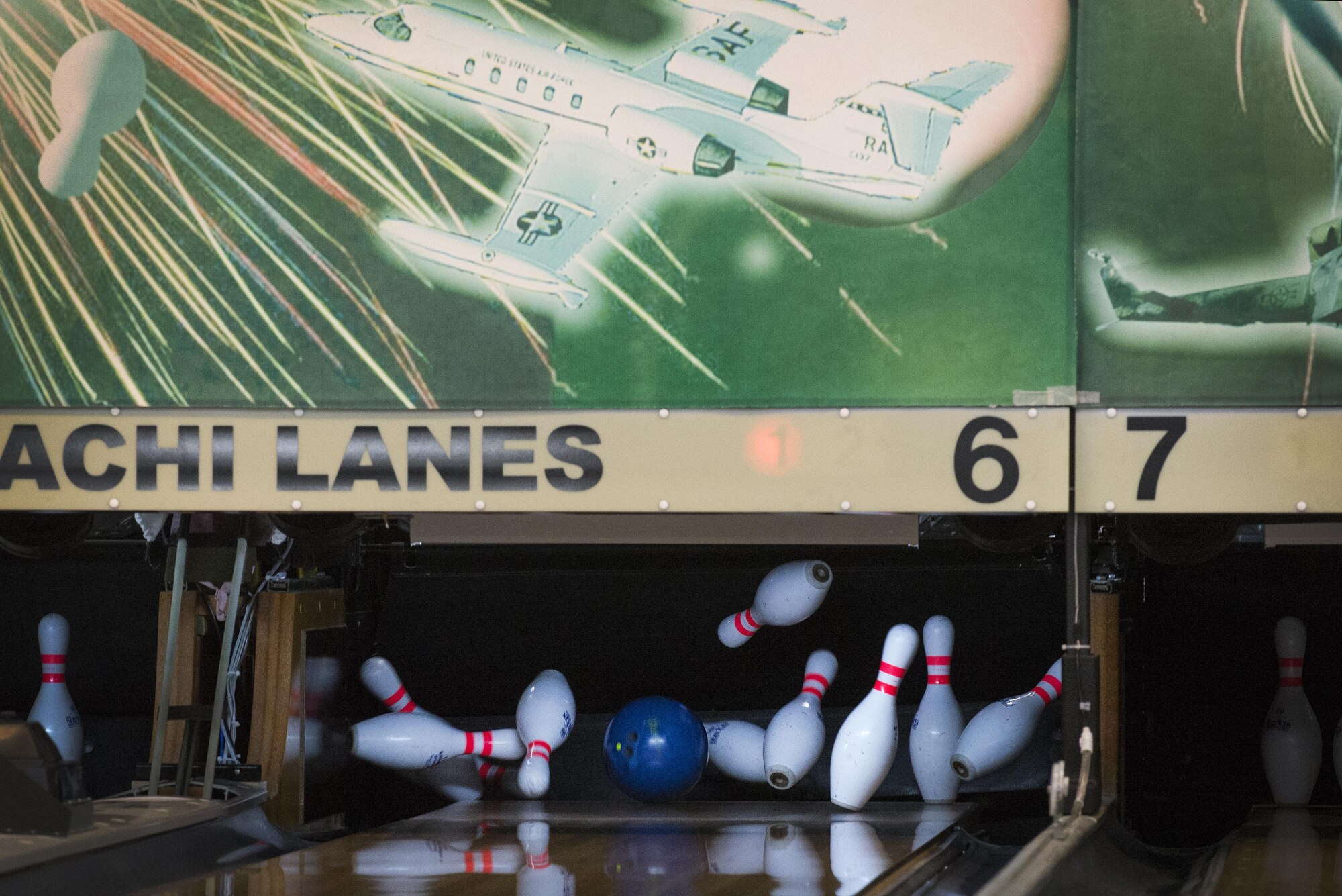 Tech. Sgt. Chuck Kropog, 374th Civil Engineer Squadron noncommissioned officer in charge of service contracts, throws a strike at Tomodachi Lanes, August 2, 2017, at Yokota Air Base, Japan.
