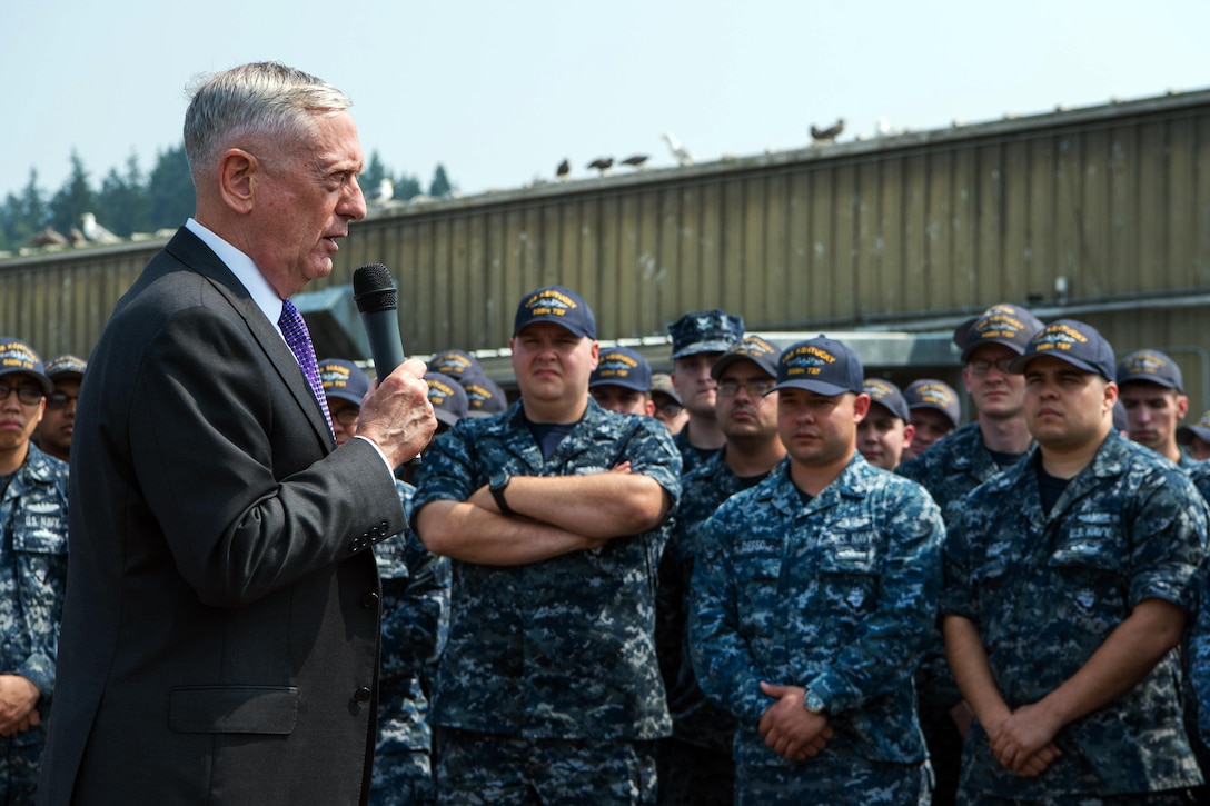 Secretary speaks to sailors.