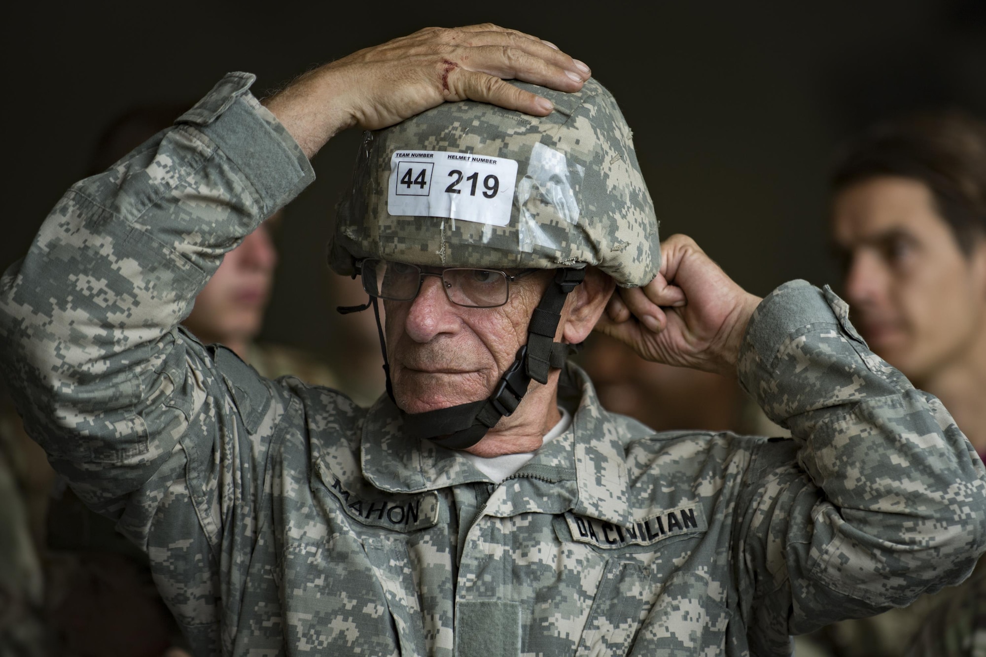 John Mahon, U.S. Army Soldier Systems Center jumper, fastens his helmet during Leapfest, Aug. 5, 2017, in West Kingstown, R.I. The Rhode Island National guard hosted the 34th annual event, which is the largest international static line jump competi-tion in the world. Team Moody’s Airmen represent-ed the only U.S. sister-service team and earned second place among 70 participating teams. (U.S. Air Force photo by Airman 1st Class Daniel Snid-er)