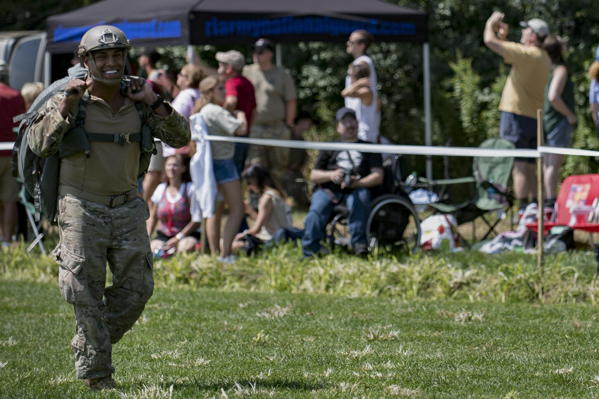 U.S. Air Force Tech. Sgt. Christopher Zavala, 822d Base Defense Squadron squad leader, carries a parachute during Leapfest, Aug. 6, 2017, in West Kingstown, R.I. The Rhode Island National guard hosted the 34th annual event, which is the largest international static line jump competition in the world. Team Moody’s Airmen represented the only U.S. sister-service team and earned second place among 70 participating teams. (U.S. Air Force photo by Airman 1st Class Daniel Snider)