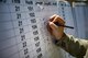 A judge transcribes scores during Leapfest, Aug. 6, 2017, in West Kingstown, R.I. The Rhode Island National guard hosted the 34th annual event, which is the largest international static line jump competition in the world. Team Moody’s Airmen represented the only U.S. sister-service team and earned second place among 70 participating teams. (U.S. Air Force photo by Airman 1st Class Daniel Snider)