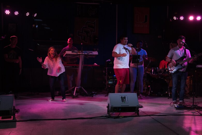 Senior Airman Samuel Chavez, a communications focal point technician assigned to the 386th Expeditionary Communications Squadron, performs with the AFCENT Band during live band karaoke at an undisclosed location in Southwest Asia, Tuesday August 8, 2017. The band’s high energy show and follow-on live band karaoke brought 386th Air Expeditionary Wing members and joint Coalition partners together for two nights of fun, laughter and fellowship. (U.S. Air Force photo by Tech. Sgt. Jonathan Hehnly)