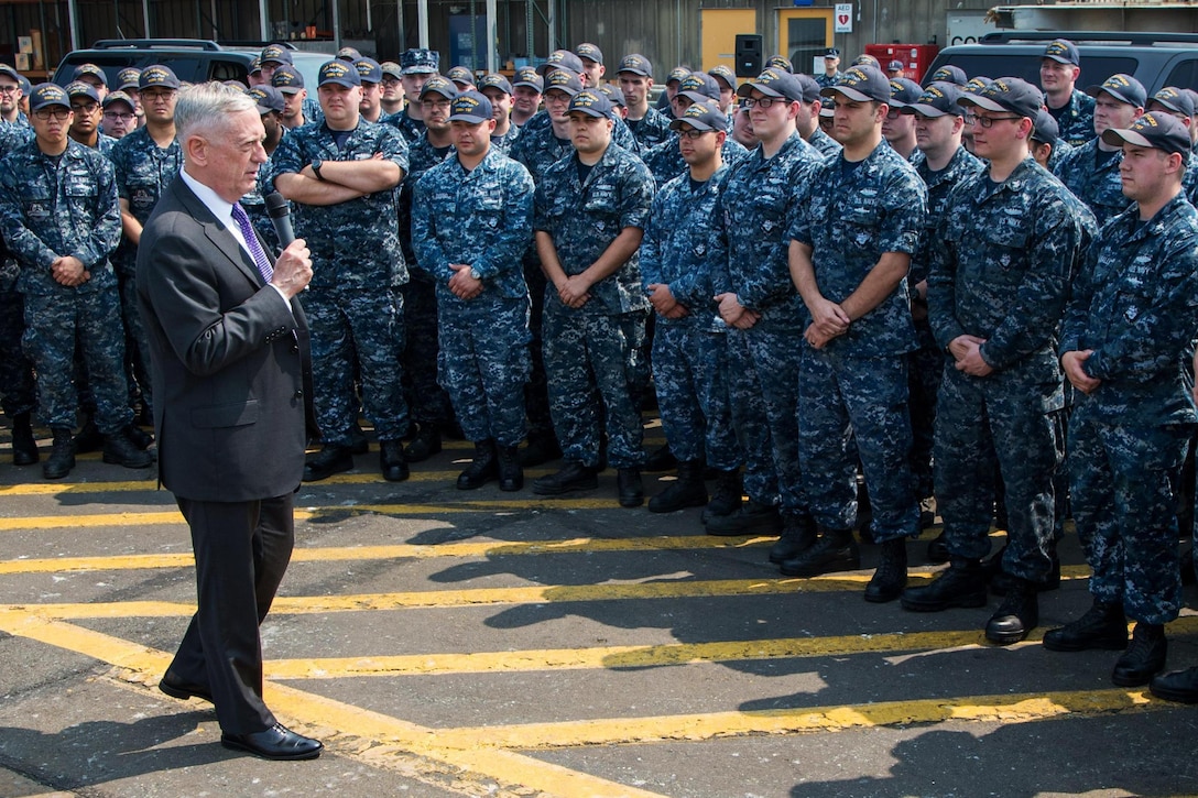 Defense Secretary Jim Mattis talks to large group of sailors.
