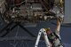 Staff Sgt. Amos Hard, 721st Aircraft Maintenance Squadron aerospace propulsion technician, works on replacing part of an engine on a C-17 Globemaster III at Spangdahlem Air Base, Germany, Aug. 9, 2017. The 726th Air Mobility Squadron worked with the 52nd Logistics Readiness Squadron vehicle operations, 52nd Civil Engineer Squadron Dirt Boyz, and 721st AMXS in support of fixing the engine which takes an average of 12 hours to complete. (U.S. Air Force photo by Staff Sgt. Jonathan Snyder)