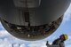 Staff Sgt. Amos Hard, 721st Aircraft Maintenance Squadron aerospace propulsion technician, assesses an engine on a C-17 Globemaster III at Spangdahlem Air Base, Germany, Aug. 9, 2017. The 726th Air Mobility Squadron worked with the 52nd Logistics Readiness Squadron vehicle operations, 52nd Civil Engineer Squadron Dirt Boyz, and 721st AMXS in support of fixing the engine which takes an average of 12 hours to complete. (U.S. Air Force photo by Staff Sgt. Jonathan Snyder)
